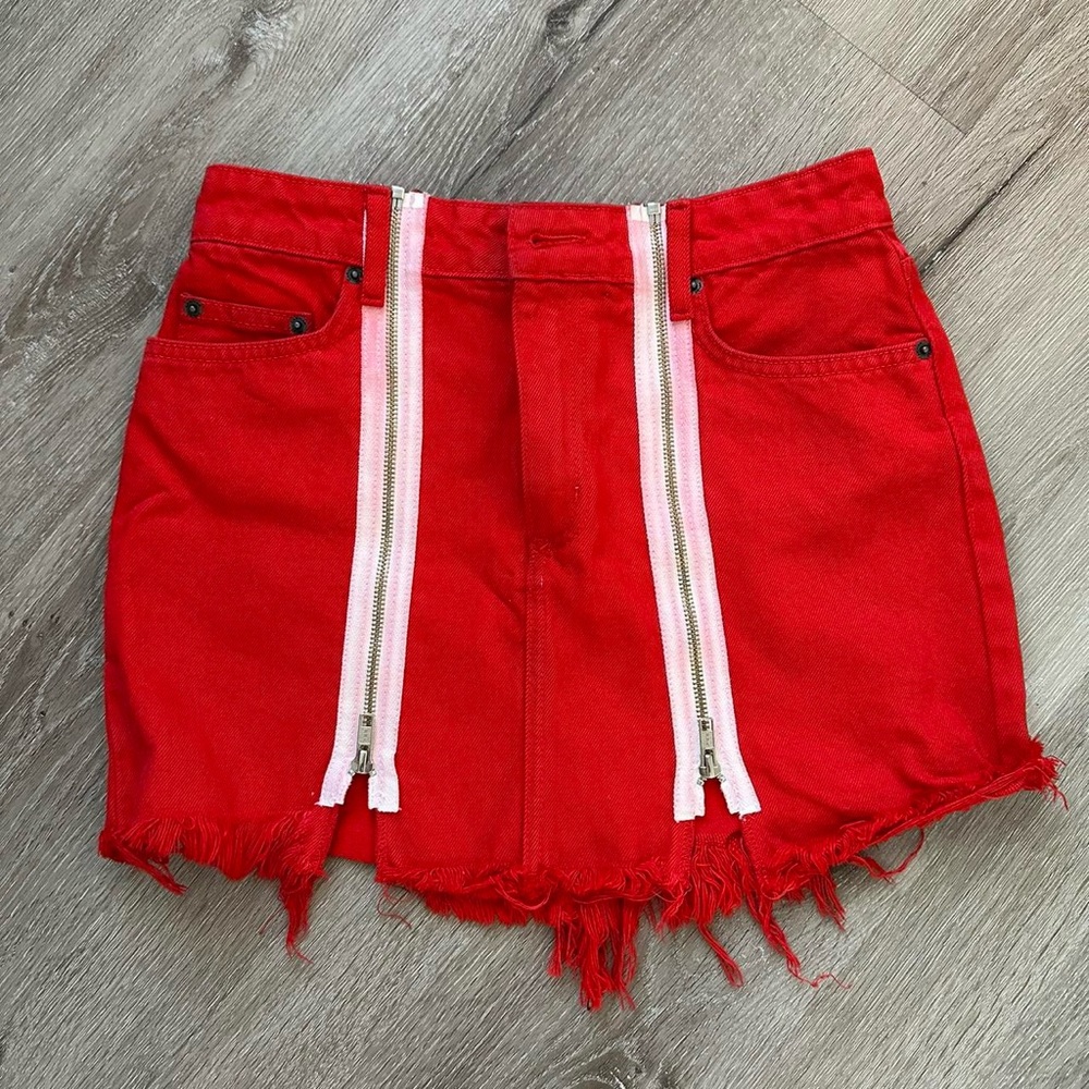 LF Carmar red mini skirt with white zippers in the middle.